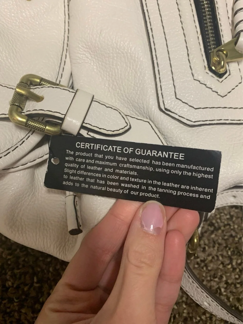 orYANY White Leather Backpack with Front Zip Pocket and Buckle Detail - Picture 4 of 9